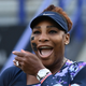 Serena Williams celebrates after winning with Tunisia’s Ons Jabeur against Spain’s Sara Sorribes Tormo and Czech Republic’s Marie Bouzkova at the end of their round of 8 women’s doubles tennis match, on day three, of the Eastbourne International tennis tournament in Eastbourne, southern England on June 21, 2022. (Photo by Glyn KIRK / AFP) (Photo by GLYN KIRK/AFP via Getty Images)